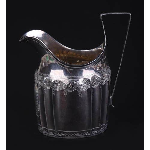 691 - A George III silver cream jug, London 1798 and maker's mark for Stephen Adams, 12cms high, 105g.