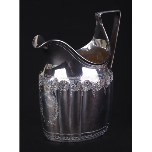 691 - A George III silver cream jug, London 1798 and maker's mark for Stephen Adams, 12cms high, 105g.