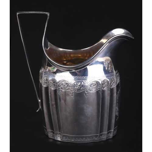 691 - A George III silver cream jug, London 1798 and maker's mark for Stephen Adams, 12cms high, 105g.