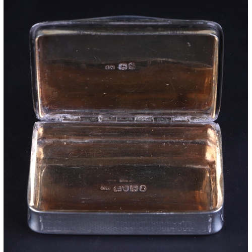 693 - A George III silver snuff box, London 1813 and maker's mark for Joseph Ash, 6.9cms long, 64g.