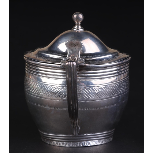 697 - A George III silver mustard pot with blue glass liner, London 1802 and maker's mark for Charles Fox,... 