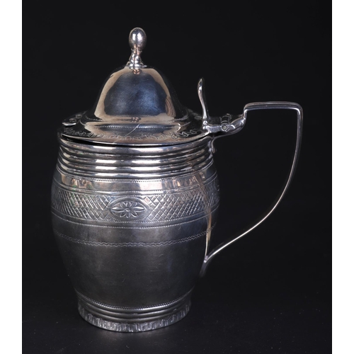 697 - A George III silver mustard pot with blue glass liner, London 1802 and maker's mark for Charles Fox,... 