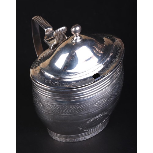 697 - A George III silver mustard pot with blue glass liner, London 1802 and maker's mark for Charles Fox,... 