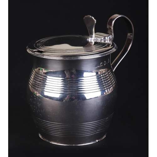 698 - A George III silver mustard pot, London 1811, 9cms high, 140g.