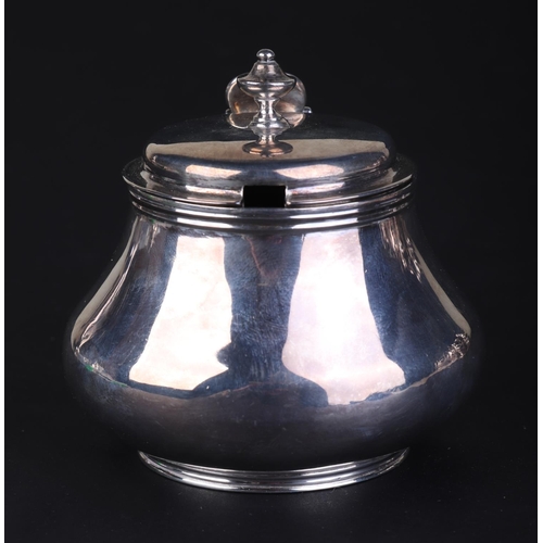 699 - A George III silver mustard pot, London 1817, 7.5cms high, 157g.