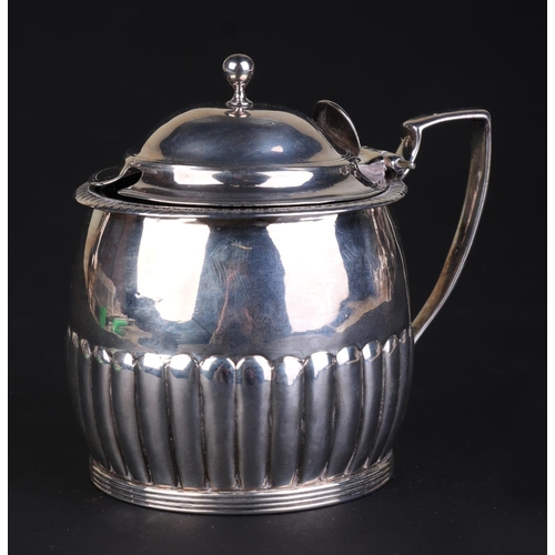 700 - A George III silver mustard pot with blue glass liner, London 1810 and maker's mark for Rebecca Emes... 