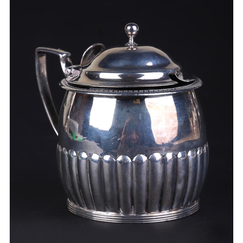 700 - A George III silver mustard pot with blue glass liner, London 1810 and maker's mark for Rebecca Emes... 