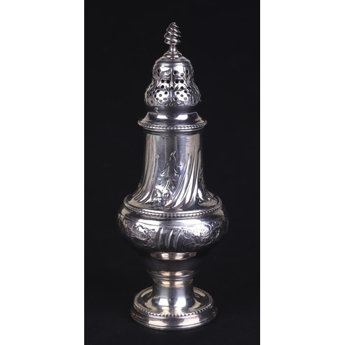 703 - A Georgian silver pepper with indistinct London hallmarks, 13.5cms high, 98g.