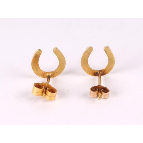 791 - A pair of 18ct gold lucky horseshoe earrings, 1.3g.