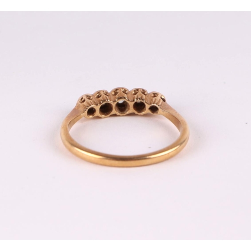 793 - An 18ct gold and five stone diamond ring, approx UK size 'N', 3g.