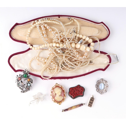 803 - A quantity of assorted costume jewellery to include a Chinese cinnabar lacquer panelled brooch; a Sc... 