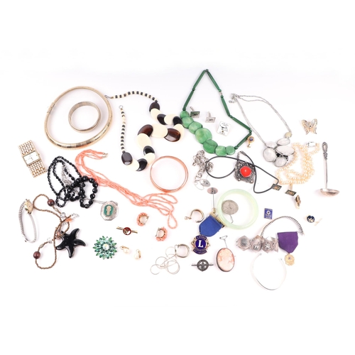 806 - A quantity of costume jewellery to include a silver fancy link bracelet; a silver Scout badge and a ... 