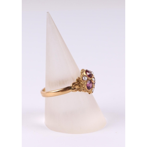 808 - An 18ct gold dress ring set with three pale pink stones and seed pearls, approx UK size N, 2.9g.