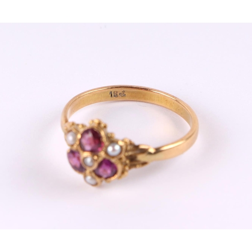 808 - An 18ct gold dress ring set with three pale pink stones and seed pearls, approx UK size N, 2.9g.