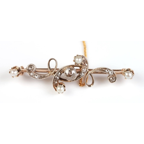 814 - A yellow metal (tests as 18ct) diamond and pearl bar brooch, boxed, 4.5cms wide, 5.6g.