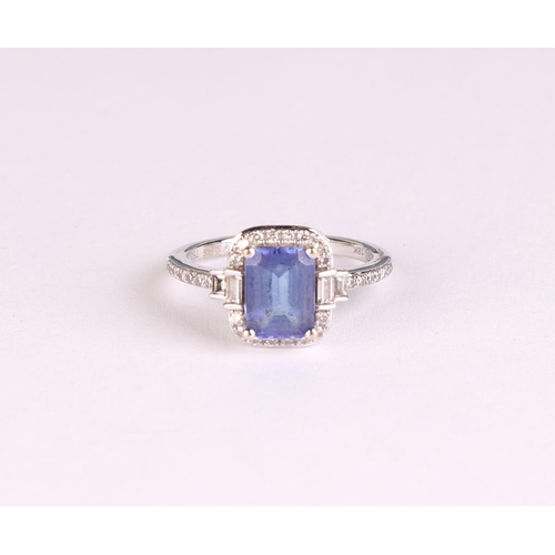 816 - An 18ct white gold tanzanite and diamond ring, approx UK size L, 3.4g.