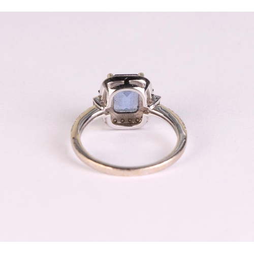 816 - An 18ct white gold tanzanite and diamond ring, approx UK size L, 3.4g.