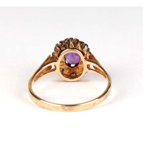 820 - A 9ct gold diamond and amethyst cluster ring, approx UK size L, 1.9g.