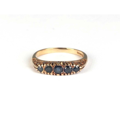 825 - A 9ct gold five-stone sapphire ring, approx UK size M, 2.6g.