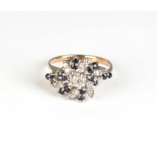 829 - A 9ct gold diamond and sapphire dress ring, approx UK size Q, 3.2g.