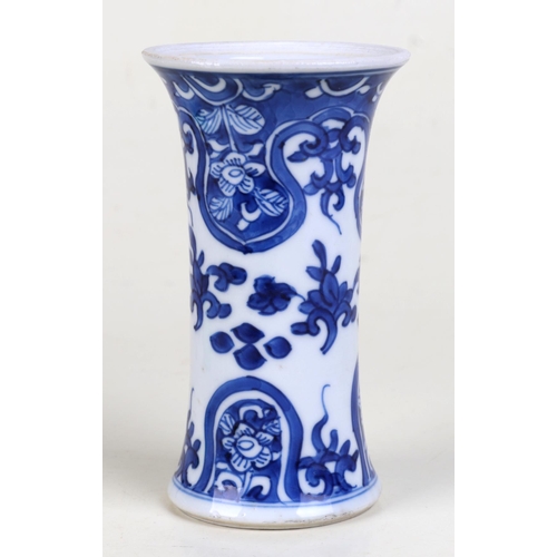 917 - A small Chinese blue and white vase of waisted form. 13cm high