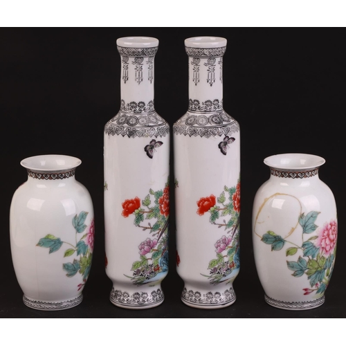 927 - A pair of Chinese Republic style vases of cylindrical form decorated with pheasants, butterflies and... 