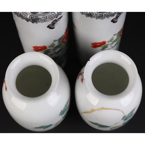 927 - A pair of Chinese Republic style vases of cylindrical form decorated with pheasants, butterflies and... 