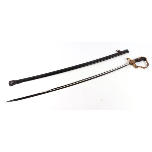 99 - A 19th century Prussian Officer's dress sword with gilt hilt, double fuller steel blade and black la... 