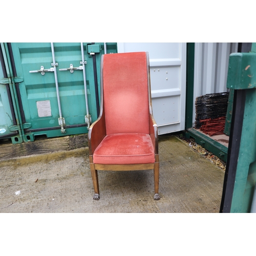 1025 - A pair of walnut high back throne type chairs with lion paw front feet (2).