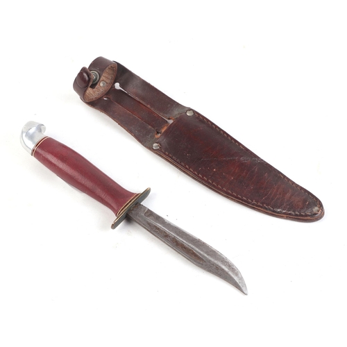 104 - A 1937 Boy Scout jamboree sheath knife and scabbard, the blade etched 'made in Finland' 19cm long