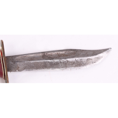 104 - A 1937 Boy Scout jamboree sheath knife and scabbard, the blade etched 'made in Finland' 19cm long