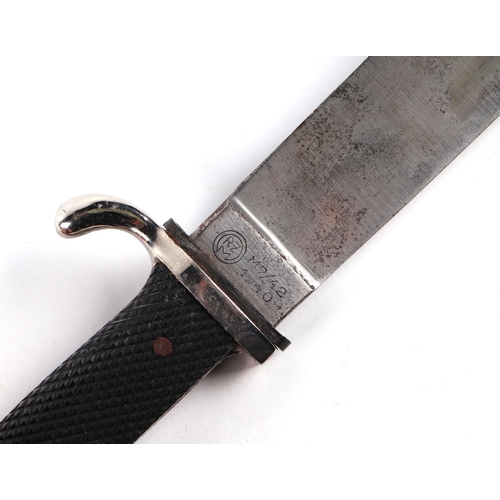 116 - A German Third Reich Hitler Youth dagger and scabbard, the blade marked 'RZM M7/42 1940'.