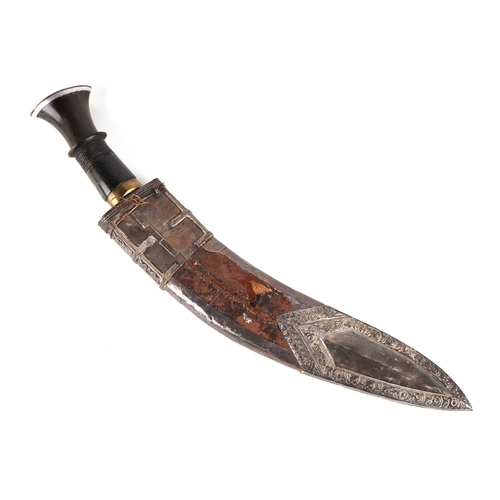 117 - An Indian kukri with ornate white and yellow metal mounted leather scabbard and horn handle, 48cms l... 