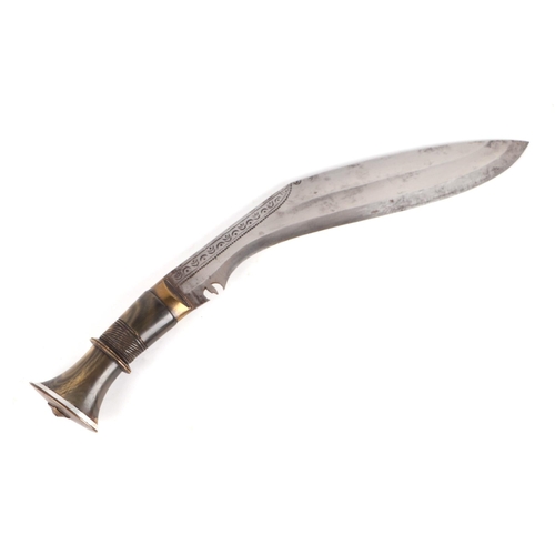 117 - An Indian kukri with ornate white and yellow metal mounted leather scabbard and horn handle, 48cms l... 