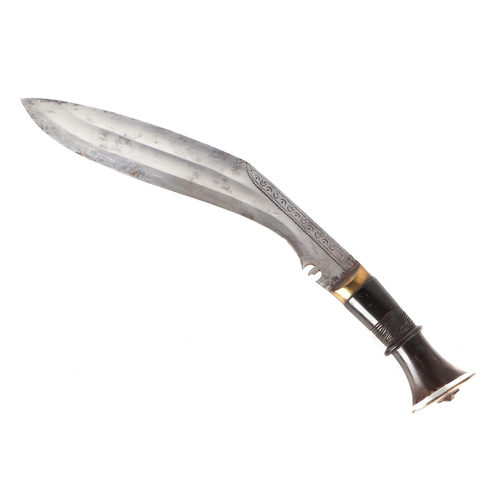 117 - An Indian kukri with ornate white and yellow metal mounted leather scabbard and horn handle, 48cms l... 