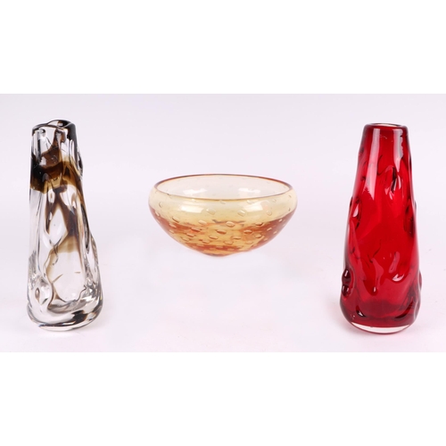 235 - A Whitefriars control bubble amber glass, 20cms diameter; together with a red knobbly glass vase; an... 