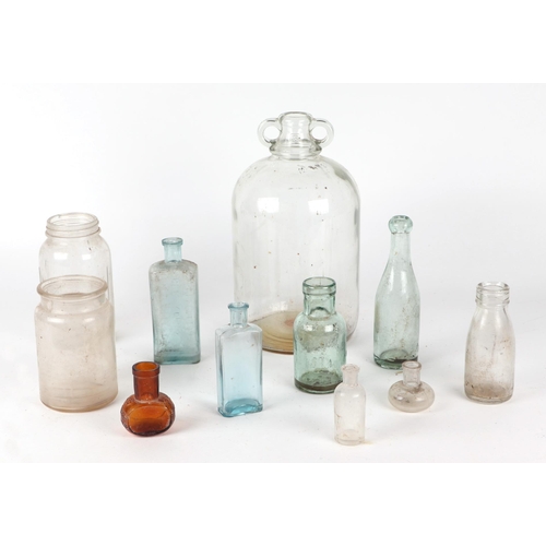 252 - A small quantity of Victorian and later glass bottles M. Millard & Sons, Trowbridge Codswallop examp... 