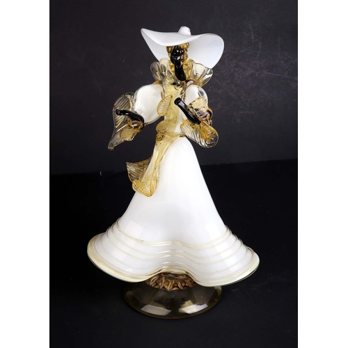 253 - An Italian Murano Art glass figure depicting a woman in a long flowing dress, 37cms high.