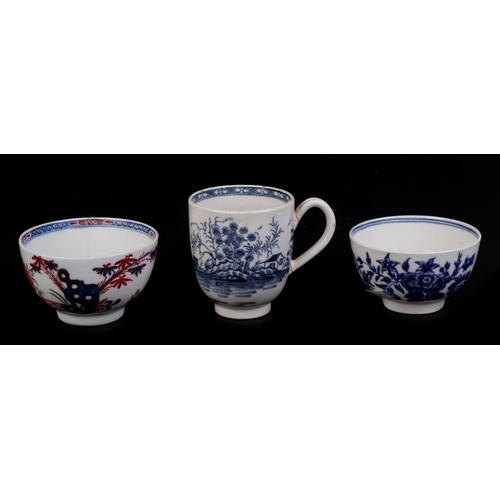 269 - An 18th century Worcester porcelain tea cup decorated with Chinese landscape scenes, blue crescent m... 