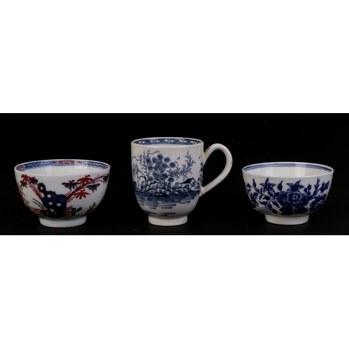 269 - An 18th century Worcester porcelain tea cup decorated with Chinese landscape scenes, blue crescent m... 