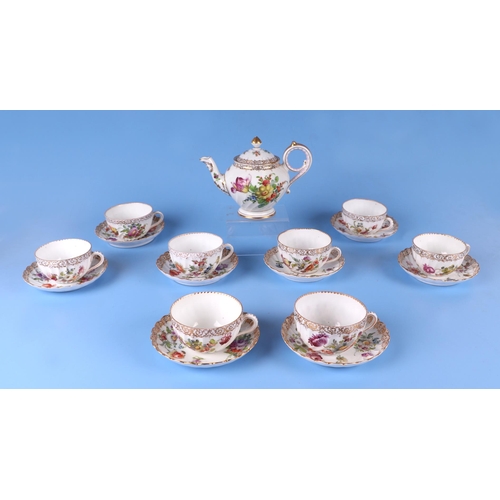 273 - Eight Dresden cups and saucers decorated with flowers, together with a similar Dresden teapot. Condi... 