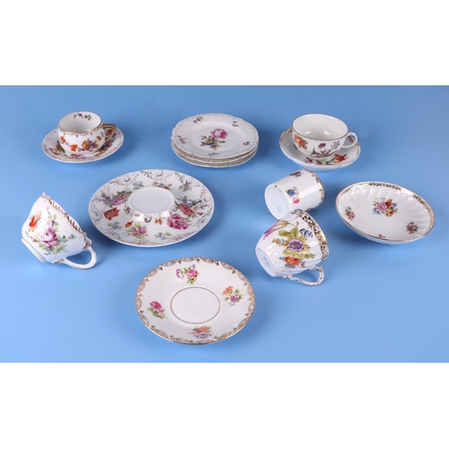 279 - A group of continental porcelain items to include a scent bottle, a top hat match striker, an oval p... 