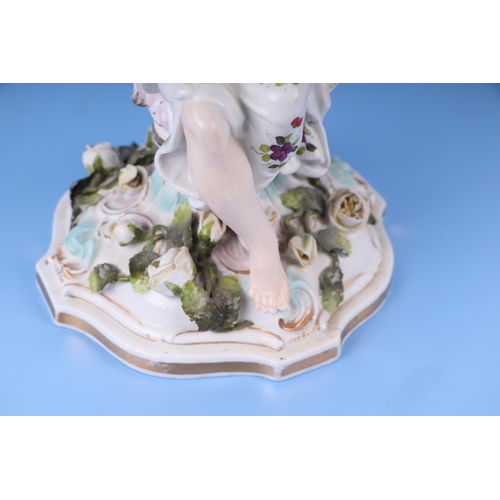 284 - Three continental porcelain figural three-armed candelabra with encrusted flower decoration, 52cms h... 