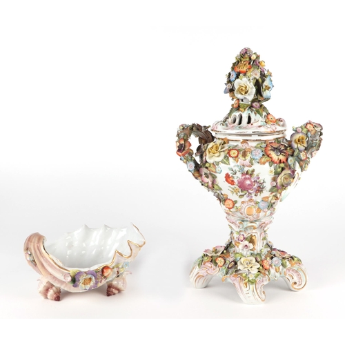 287 - A continental flower encrusted two-handled urn & cover, 38cms high; together with a similar shell sh... 