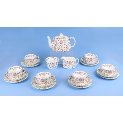 292 - A Minton Haddon Hall pattern teaset; together with six Savoy China coffee cans and saucers.