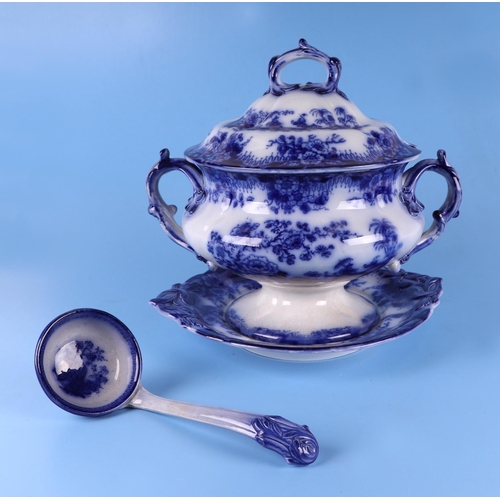 295 - A quantity of assorted Willow pattern and blue & white dinner wares to include a flow blue tureen & ... 