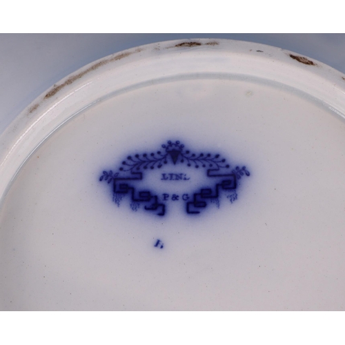 295 - A quantity of assorted Willow pattern and blue & white dinner wares to include a flow blue tureen & ... 