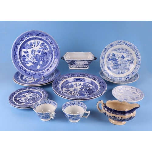 295 - A quantity of assorted Willow pattern and blue & white dinner wares to include a flow blue tureen & ... 