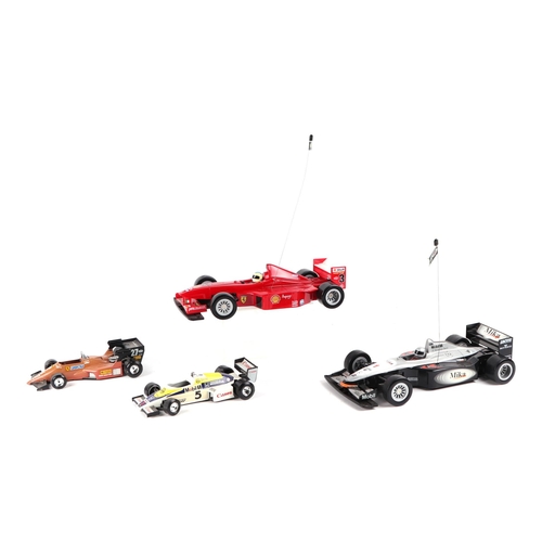 30 - A small quantity of F-1 GP scale models to include a 1:121 scale Ferrari McLaren and 1:18 scale mode... 