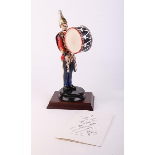 305 - A Micheal Sutty model of a First King's Dragoon Guards bass drummer, 39/250 from the British Militar... 